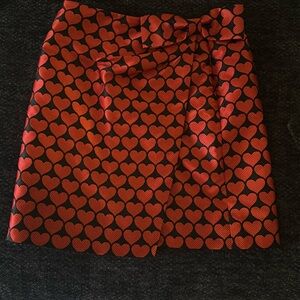 Lined heart faux wrap mini skirt